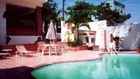 The pool and the deck of the Hotel CASA COCO - Boca Chica - Dominican Republic